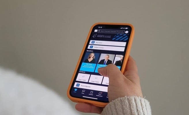 Person using networking app for last mile logistics conference